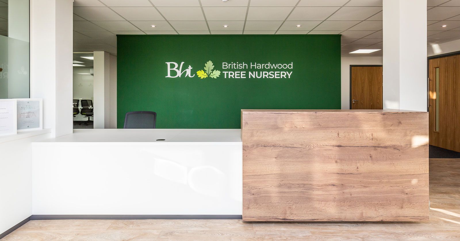 British Hardwood Tree Nursery Reception Desk by APSS Joinery with Signage