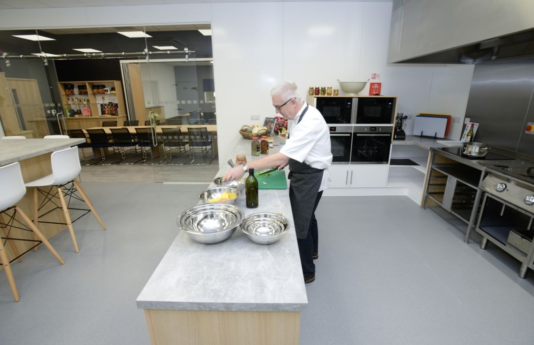 Trevor Holmes Innovation Manager cooking in the new Innovation Centre at Sleaford Quality Foods