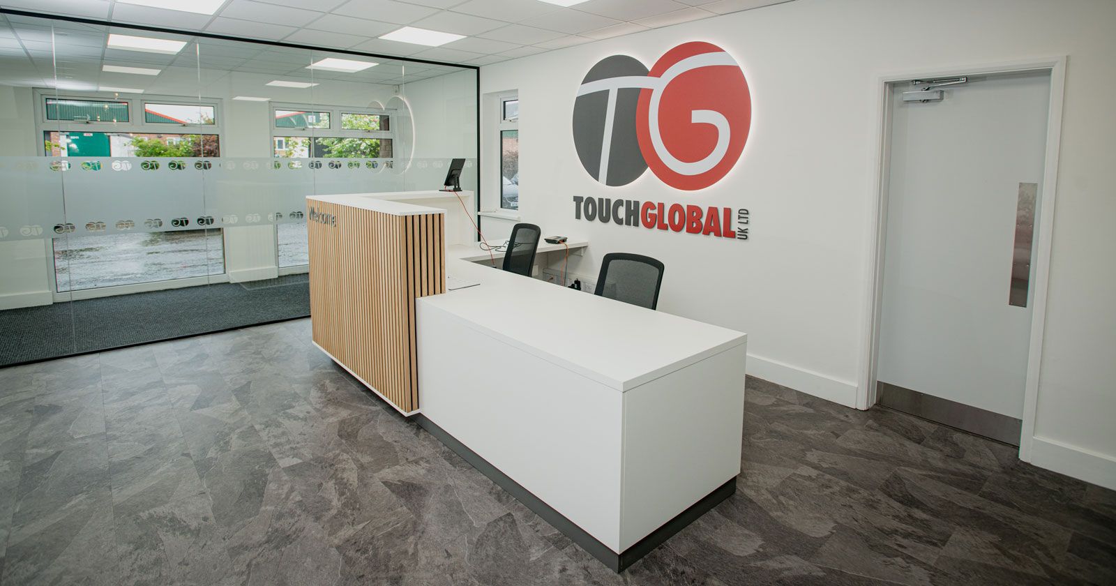 Touch Global Bespoke Reception Desk Design and Installed by APSS Joinery