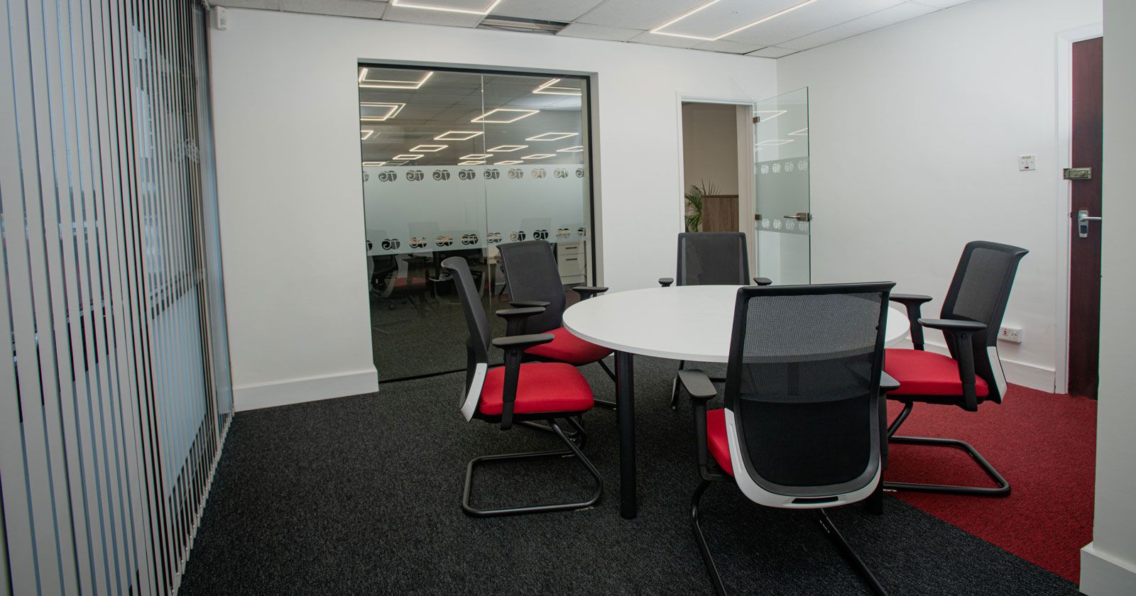 Touch Global Office Meeting Room Design and Installed with Glass Partitions and Manifestations by APSS