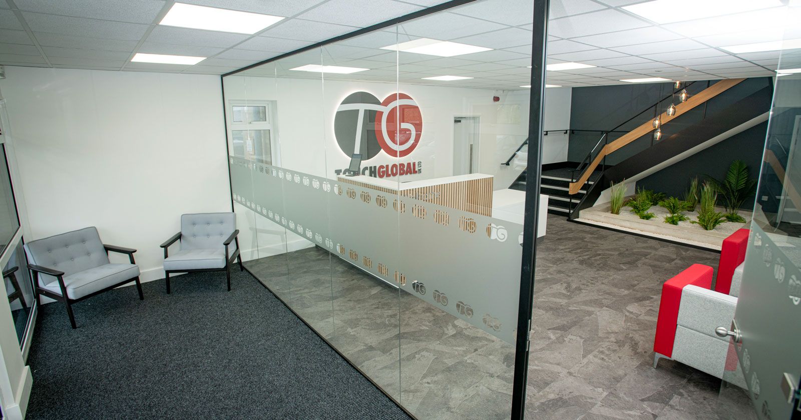 Touch Global Reception Meeting Room Design and Installed with Glass Partitions and Manifestations by APSS