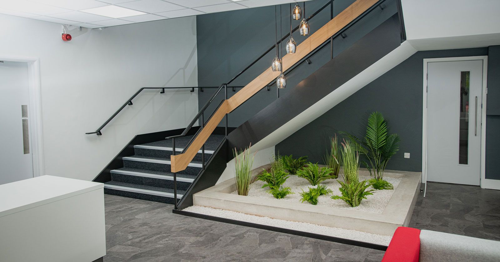 Touch Global Under Stairs Indoor Reception Feature Design by APSS