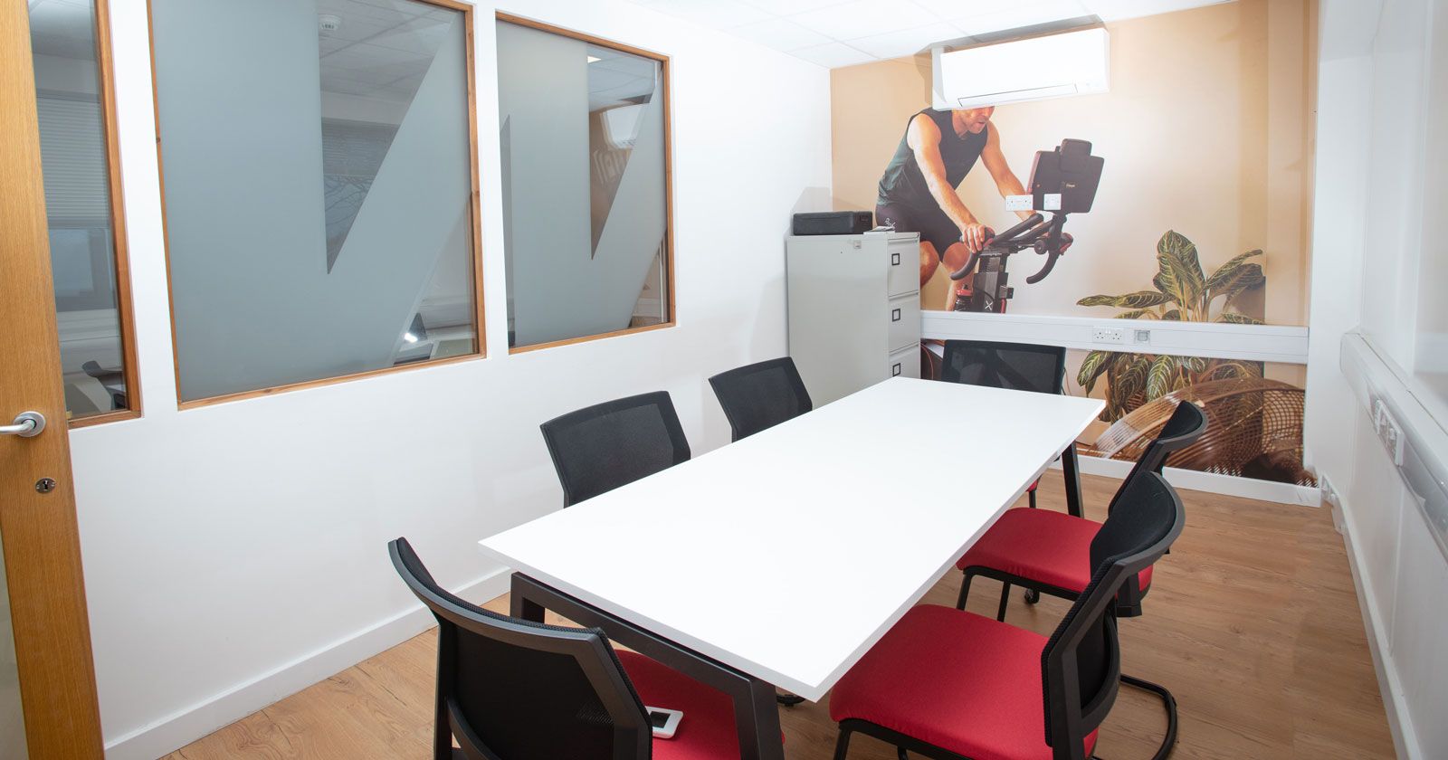 Wattbike Meeting room with Floor to Ceiling Graphics Office Design