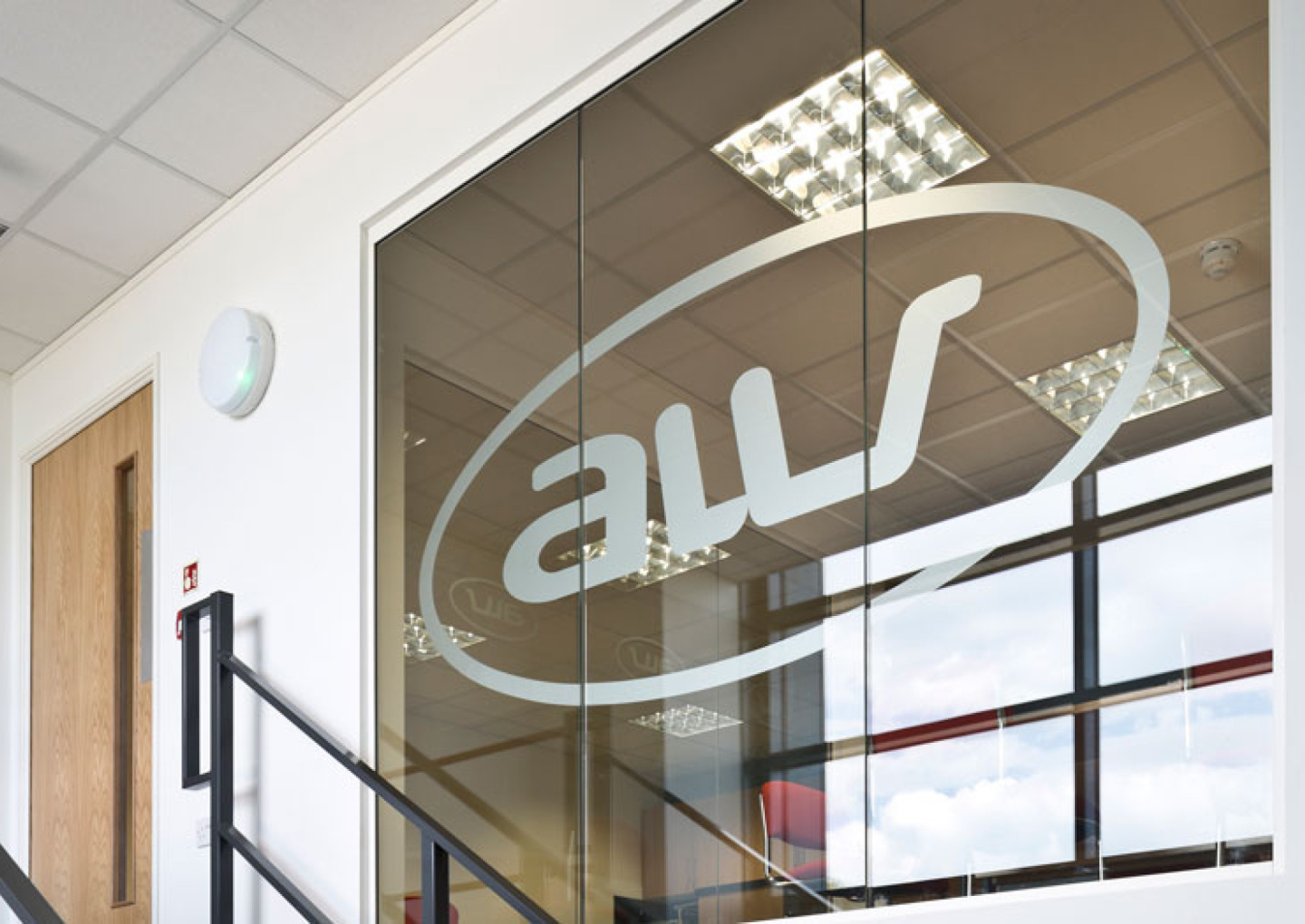 Glass partitions and office installation on mezzanine