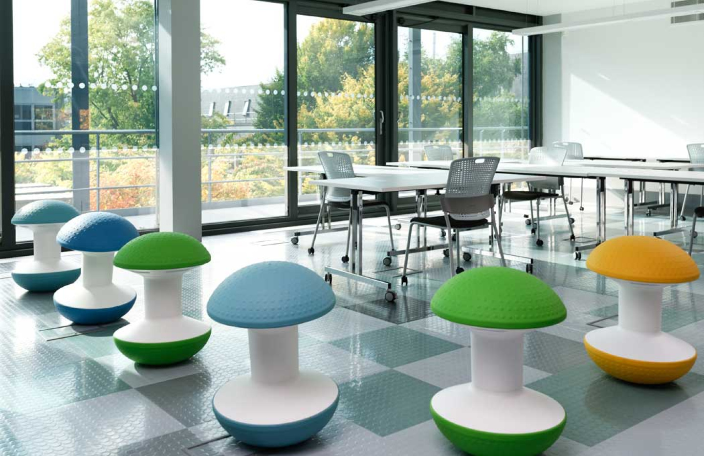 Loughborough-University-PolyFloor-and-Glass-Partitions-Curtain-Wall-and-Colourful-Seating-By-APSS