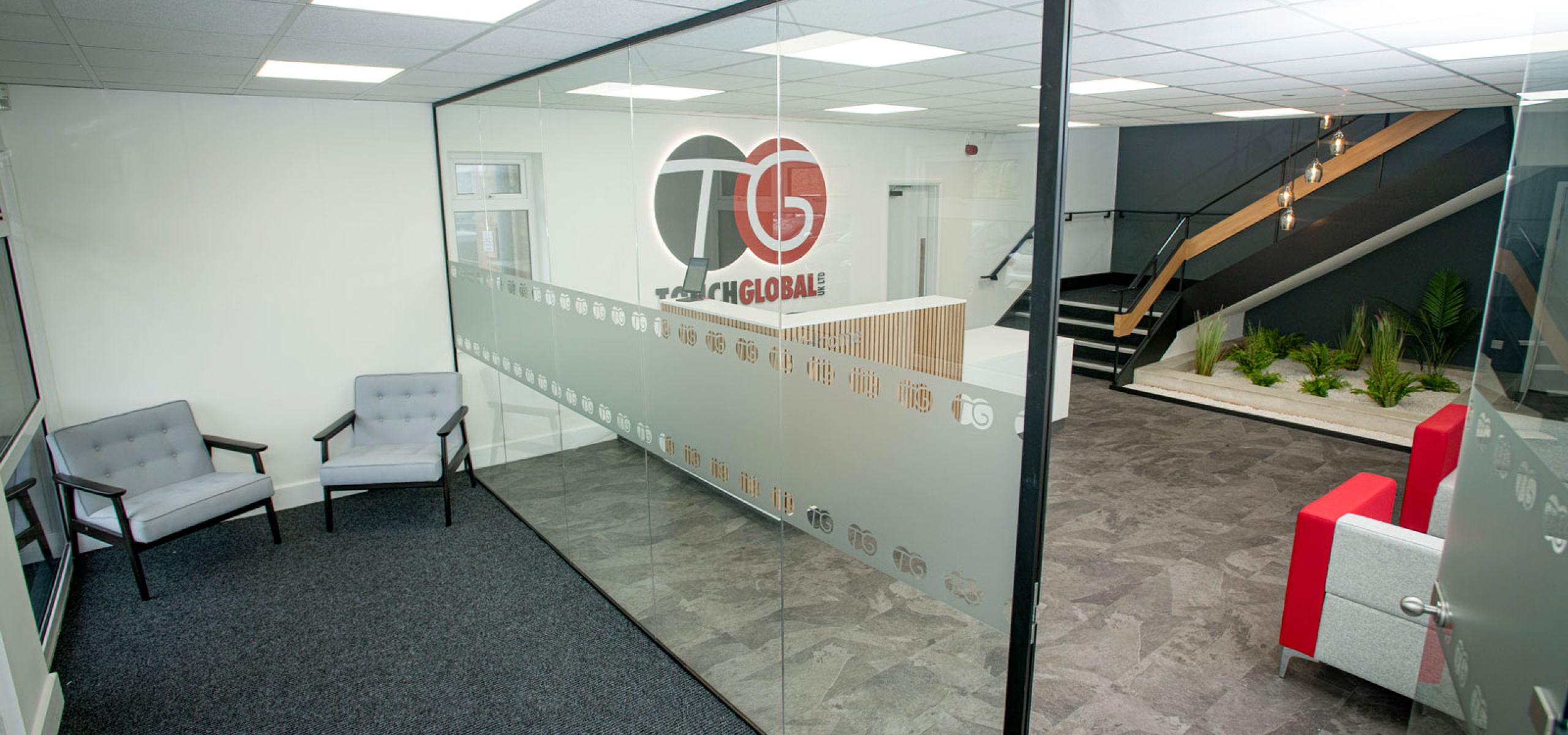Touch Global Reception Meeting Room Design and Installed with Glass Partitions and Manifestations by APSS