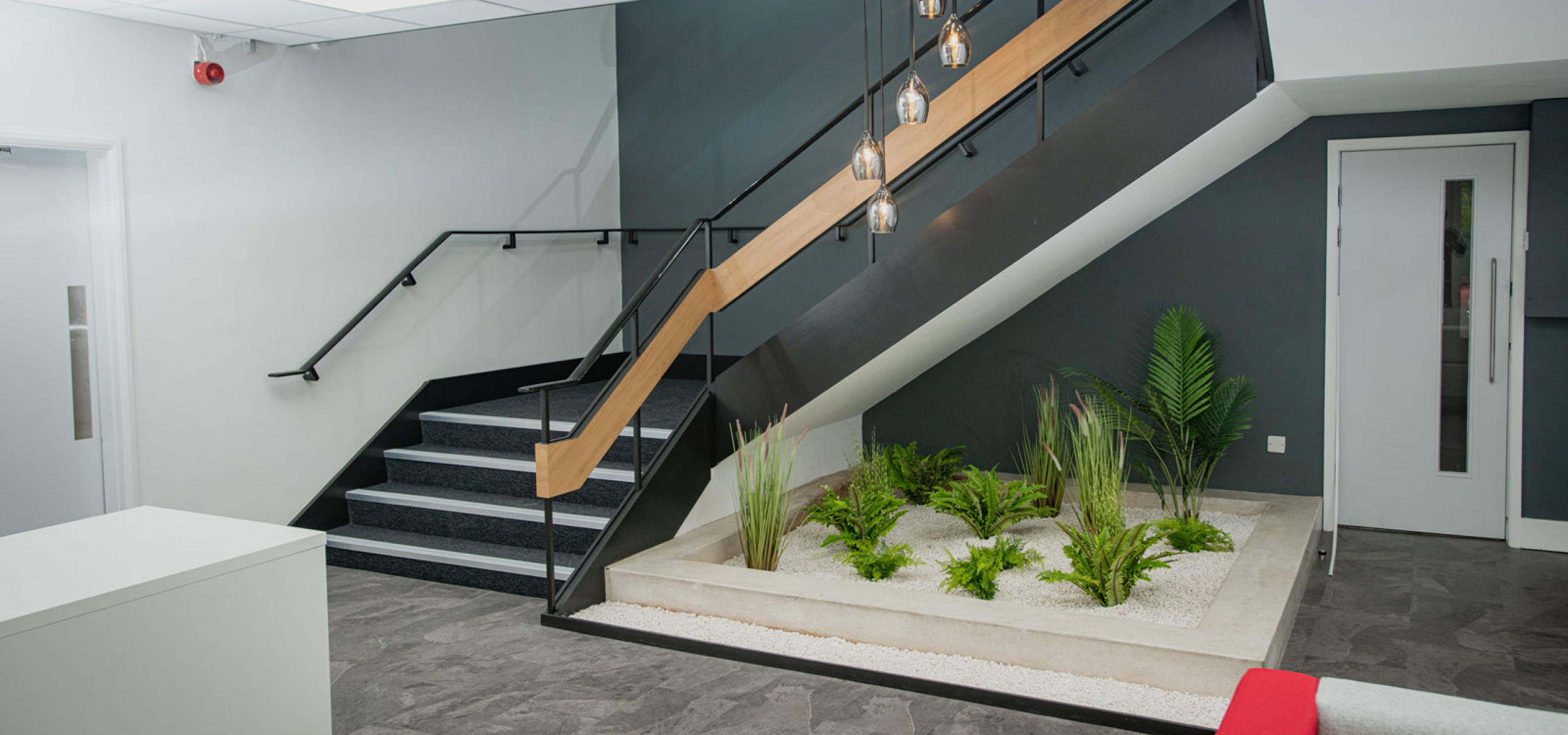 Touch Global Under Stairs Indoor Reception Feature Design by APSS
