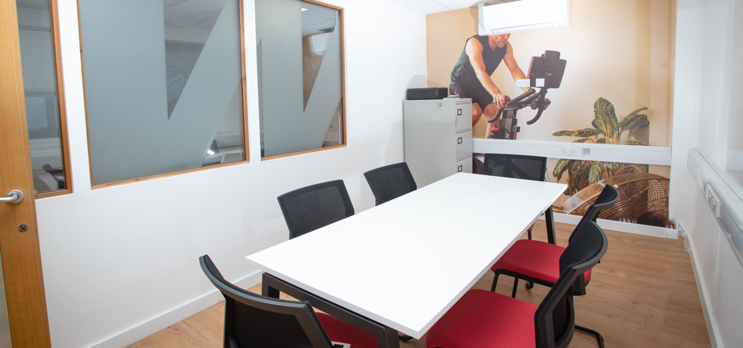 Wattbike Meeting room with Floor to Ceiling Graphics Office Design