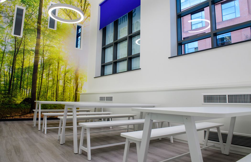 Paradigm-Land-Sumus-Uk-halo-lighting-school-canteen-seating-area-with-feature-wall-by-APSS