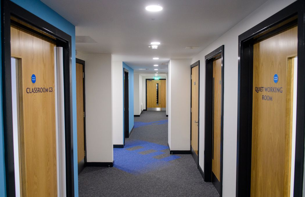Paradigm-Land-Sumus-Uk-school-fit-out-corridor-with-feature-carpets-by-APSS